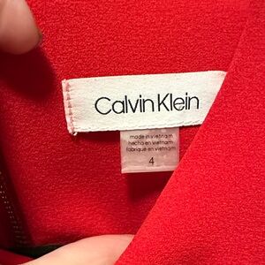 Striking Red Calvin Klein Midi Dress with Ruffled Sleeves